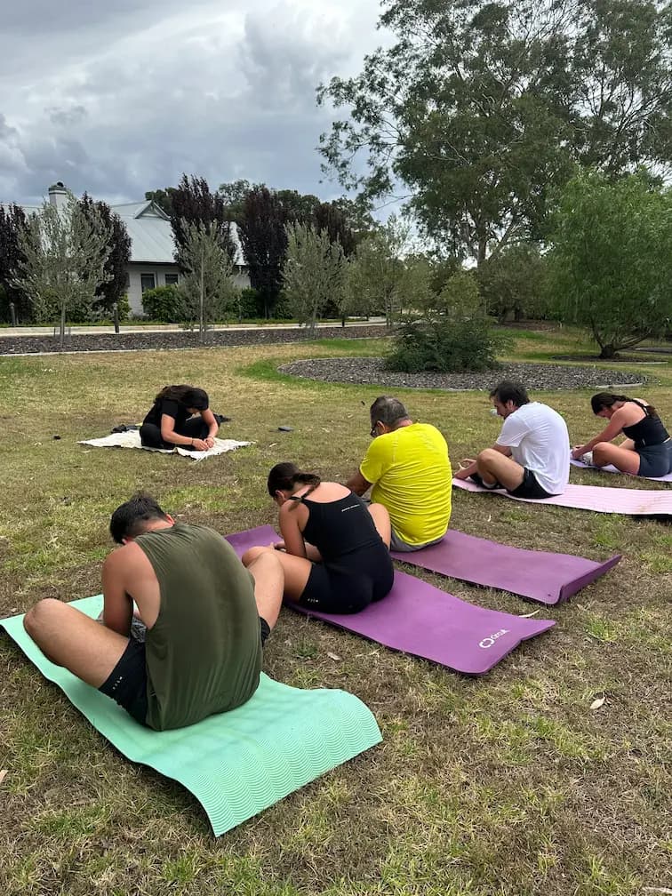 Outdoor team fitness and stretching session
