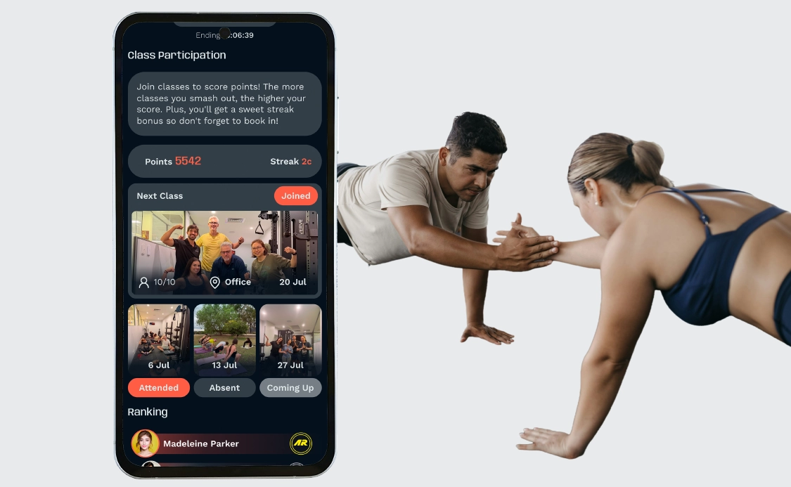 Activ-AR Class Participation Challenge - Book on-site classes and earn streak bonuses Two employees doing a partner plank during an on-site corporate fitness class, with the Activ-AR app tracking attendance and streaks